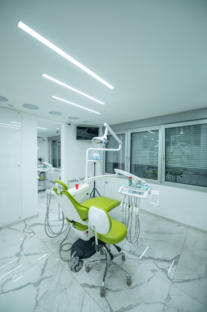 Interior of white modern dentistry medical room with special equipment